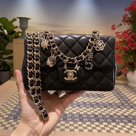 chanel logo bag charm|chanel purse price guide.